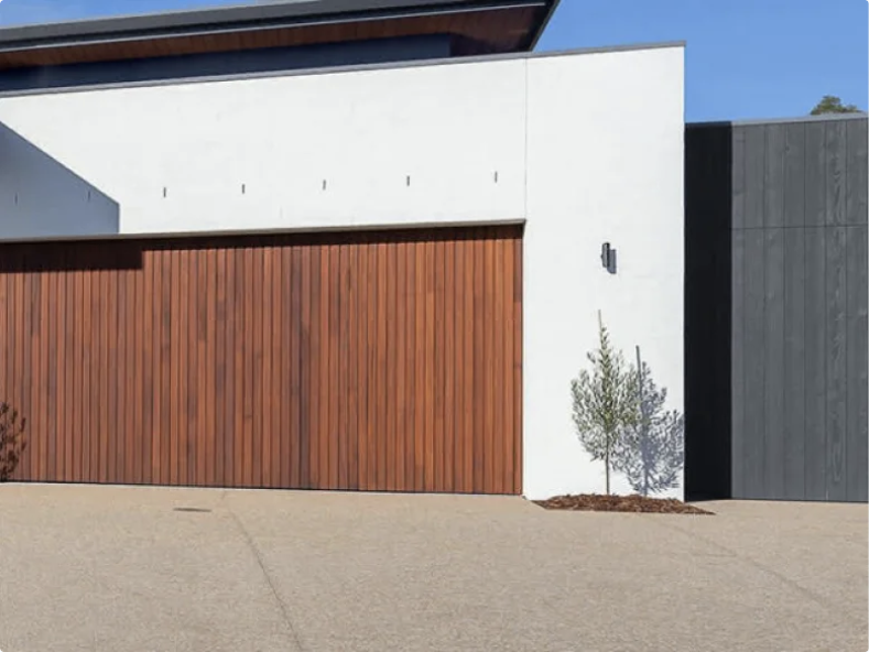 Garage door showing signs of wear and needing a professional service